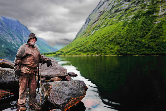 Fisherman standing on rocks copy. for emailtif